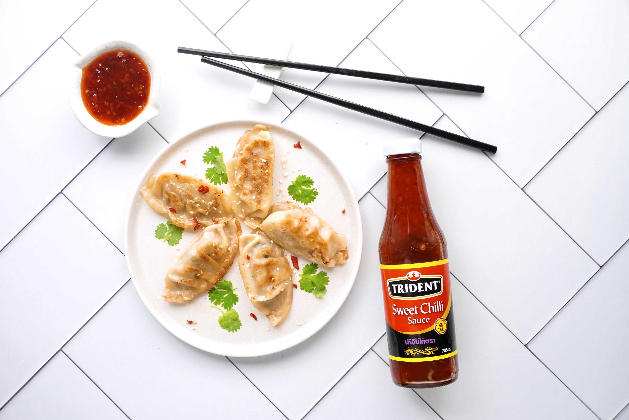Pork and prawn dumplings with Tridents sweet chilli sauce